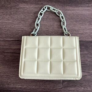 Mint green SHEIN purse with chain detail on the front